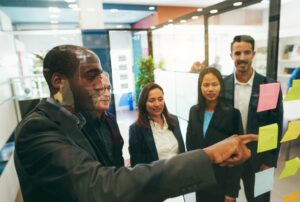 multiracial colleagues working inside business office